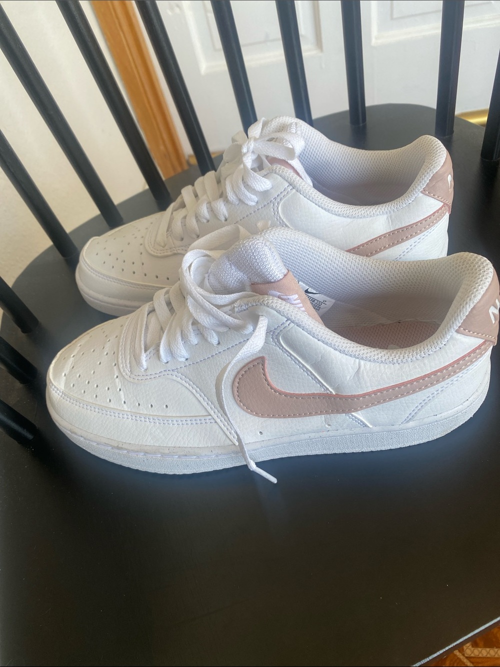 Nike White Low-Top Sneakers with Pink Accent Swoosh